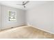 Cozy bedroom filled with natural light from a window and carpeted floor at 22330 Torrence Chapel Rd, Cornelius, NC 28031
