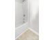 Bright white shower area with a tub and tile flooring at 22330 Torrence Chapel Rd, Cornelius, NC 28031