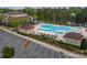 An aerial view of the community pool and surrounding amenities offers an inviting oasis for residents to enjoy at 23147 Whimbrel Cir, Fort Mill, SC 29707