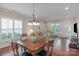Inviting dining area with natural light and stylish decor, perfect for Gathering meals at 23147 Whimbrel Cir, Fort Mill, SC 29707