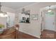 Bright and airy dining area with a view into the kitchen and easy access to other living spaces at 23147 Whimbrel Cir, Fort Mill, SC 29707