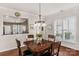 Welcoming dining area bathed in natural light, adjacent to the kitchen, perfect for entertaining at 23147 Whimbrel Cir, Fort Mill, SC 29707