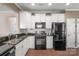 Well-appointed kitchen with granite countertops, stainless appliances, and ample storage at 23147 Whimbrel Cir, Fort Mill, SC 29707
