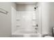 This renovated bathroom features a shower-tub combo with a shower head and shelving at 2322 Hedgewood Cir, Gastonia, NC 28052