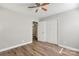 Bedroom featuring hardwood floors and double door closet at 2322 Hedgewood Cir, Gastonia, NC 28052