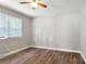 Bedroom with hardwood floors and natural light from the window at 2322 Hedgewood Cir, Gastonia, NC 28052
