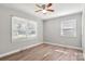 Bedroom features hardwood floors, a ceiling fan and plenty of natural light at 2322 Hedgewood Cir, Gastonia, NC 28052