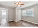 Bedroom with hardwood floors, a ceiling fan and natural light from the window at 2322 Hedgewood Cir, Gastonia, NC 28052