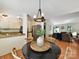 Open-concept dining area connecting to the kitchen and living room, creating a bright and airy space at 2401 Birnen Dr, Charlotte, NC 28210