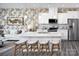 Well-appointed kitchen featuring stainless steel appliances, white cabinetry, and a large center island at 2460 Hedgecliff Rd, Kannapolis, NC 28025