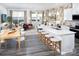 Open-concept kitchen and living area with stylish decor and access to outdoor patio at 2460 Hedgecliff Rd, Kannapolis, NC 28025