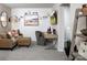 Comfortable living space with modern furnishings, unique decor, and access to the laundry room at 2460 Hedgecliff Rd, Kannapolis, NC 28025