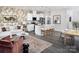 Inviting living area with contemporary decor, open to kitchen, and dining space for seamless entertaining at 2460 Hedgecliff Rd, Kannapolis, NC 28025