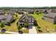 Aerial view of the house with a well-maintained lawn in a community of homes at 2511 Carnation Dr, Harrisburg, NC 28075
