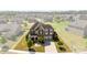 Aerial view of the house with a well-maintained lawn in a community of homes at 2511 Carnation Dr, Harrisburg, NC 28075