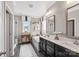 This bathroom offers a double vanity, soaking tub, and shower for a spa-like experience at home at 2511 Carnation Dr, Harrisburg, NC 28075