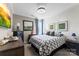 The bedroom is complete with stylish decorations, soft lighting, and cool colors for a soothing atmosphere at 2511 Carnation Dr, Harrisburg, NC 28075