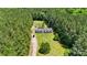 Aerial view of a home nestled in a lush, green, forested area with ample space at 2784 Leadoff Rd, Lancaster, SC 29720