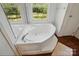 Bathroom features garden tub with window view of large yard at 2784 Leadoff Rd, Lancaster, SC 29720