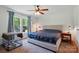 Comfortable bedroom with natural light, ceiling fan, and modern decor at 2784 Leadoff Rd, Lancaster, SC 29720