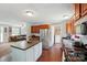 Open kitchen flowing into the living area and adjacent laundry room at 2784 Leadoff Rd, Lancaster, SC 29720