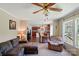 Spacious living room adjacent to kitchen offers ample seating, natural light, and ceiling fan at 2784 Leadoff Rd, Lancaster, SC 29720