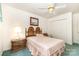 Bedroom features a ceiling fan and double-door closet at 302 6Th Sw St, Conover, NC 28613