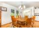 Cozy dining room with natural light, wood floors, access to the laundry room and backyard at 302 6Th Sw St, Conover, NC 28613