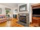 Close up of the living room fireplace with a decorative marble surround and mantel at 302 6Th Sw St, Conover, NC 28613