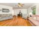 Bright living room featuring hardwood floors, neutral walls and comfortable seating at 302 6Th Sw St, Conover, NC 28613