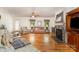 Bright living room with hardwood floors, fireplace, and traditional furnishings at 302 6Th Sw St, Conover, NC 28613