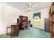 This home office is equipped with a desk, chair, bookcase, and bright natural light at 302 6Th Sw St, Conover, NC 28613