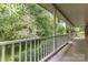 Relaxing porch view overlooking a lush, green landscape, perfect for enjoying the outdoors at 302 6Th Sw St, Conover, NC 28613