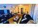 Cozy living room featuring hardwood floors, neutral walls, and ample natural light at 3232 Marlborough Rd, Charlotte, NC 28208