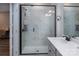 Updated bathroom showcases a glass shower with elegant tile work and modern fixtures at 3252 Cheyney Park Dr, Charlotte, NC 28269