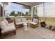 Comfortable screened porch with seating offers a relaxing outdoor living space at 3252 Cheyney Park Dr, Charlotte, NC 28269