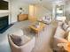 Bright living room with fireplace, plush seating, and neutral decor, virtually staged at 3510 Heathcott Cir, Charlotte, NC 28262