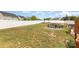 Large backyard with a fire pit and ample lawn space, perfect for outdoor activities and entertaining at 3618 Catherine Creek Pl, Davidson, NC 28036