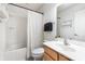 Well-lit bathroom with a shower-tub combo and classic vanity offers a clean and functional design at 3618 Catherine Creek Pl, Davidson, NC 28036