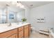 Bathroom with double sinks and a soaking tub at 3618 Catherine Creek Pl, Davidson, NC 28036