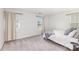 Bedroom featuring a soft color palette, three windows, and carpeted floors at 3618 Catherine Creek Pl, Davidson, NC 28036