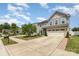 Attractive two-story home with a neatly landscaped front yard and a spacious driveway, exuding curb appeal at 3618 Catherine Creek Pl, Davidson, NC 28036