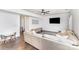 Cozy living room featuring a large sectional sofa, TV, and play area at 3618 Catherine Creek Pl, Davidson, NC 28036