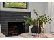 Elegant fireplace with a stone surround, perfect for cozy evenings at 4021 Paisley Pl, Charlotte, NC 28208