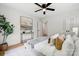 Modern main bedroom boasting hardwood floors, stylish furniture, and an adjacent ensuite, perfect for unwinding at 4021 Paisley Pl, Charlotte, NC 28208