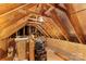This attic with exposed beams is perfect for extra storage and organization in your new home at 45523 Misty Bluff Dr, Charlotte, NC 28278