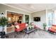 Cozy sun room featuring an outdoor view, comfortable furniture and slate flooring at 45523 Misty Bluff Dr, Charlotte, NC 28278