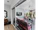 Bright sun room boasts comfortable seating, a ceiling fan and exterior views at 45523 Misty Bluff Dr, Charlotte, NC 28278