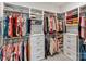 Organized walk-in closet with ample shelving and storage drawers, perfect for wardrobe management at 45523 Misty Bluff Dr, Charlotte, NC 28278