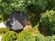 Aerial view of a home with a spacious backyard, deck, and mature trees, offering privacy at 4790 Cascade Ave, Rock Hill, SC 29732